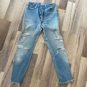 Redone Levi’s light blue jeans with rips